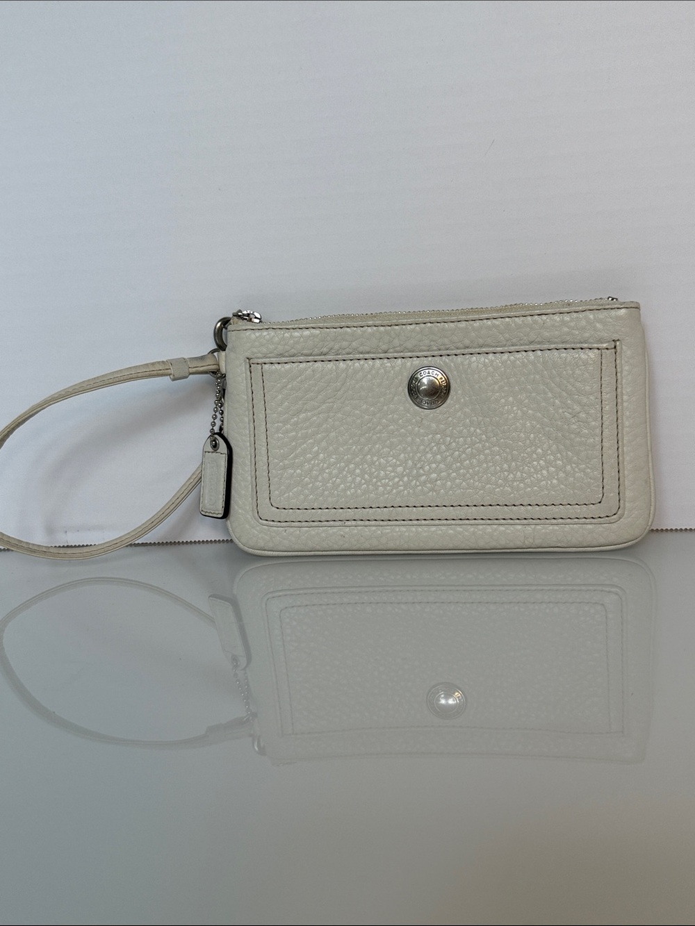 Coach Pebbled Leather Wristlet in Cream